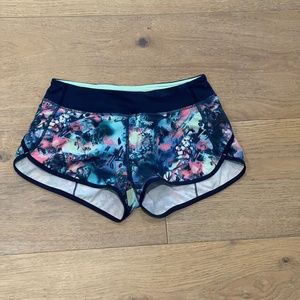 Blue/purple kids athletic shorts made by Ivivva